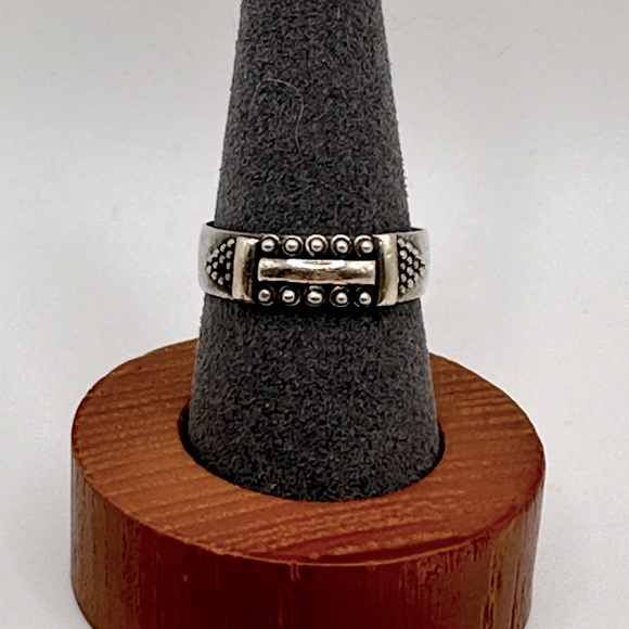 Jewelry - Sterling silver and gold-tone ring with raised detail - size 7